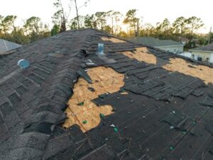 A roof with a damaged roof in Logan, Utah